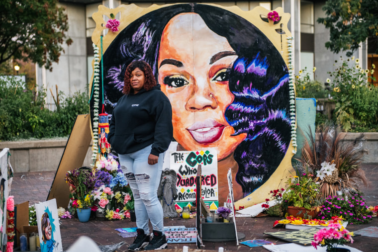 Tamika Palmer, mother of Breonna Taylor, poses for a portrait in front of a mural of her daughter at Jefferson Square park on Sept. 21, 2020 in Louisville, Ky.