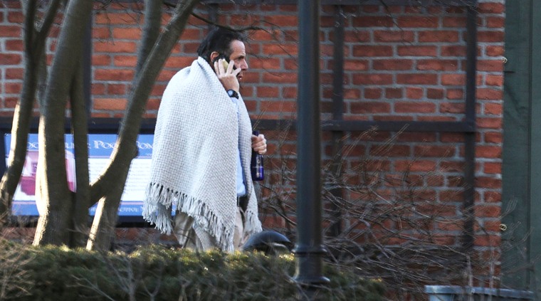 Image: New York Governor Andrew Cuomo walks on the grounds of the Governor's Mansion following allegations that he had sexually harassed young women, in Albany, New York