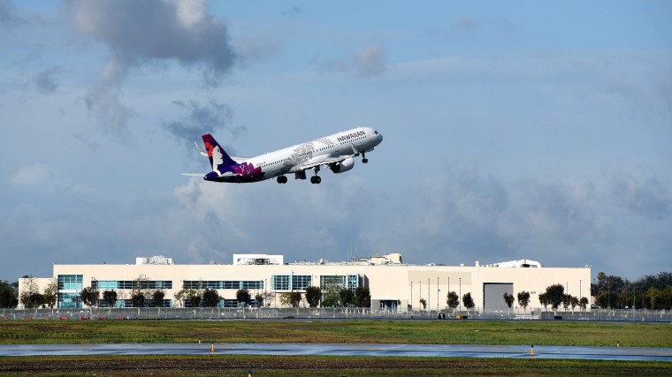 A Hawaiian Airlines takes off from Long Beach, Calif., on March 10, 2021.