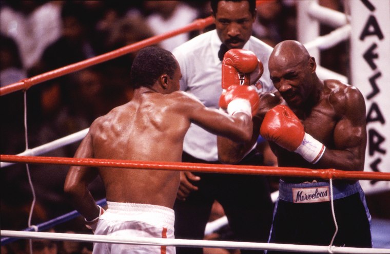 Sugar Ray Leonard, left, battles Marvelous Marvin Hagler, right, during a middleweight bout at Caesars Palace in Las Vegas on April 6, 1987. Leonard won a 12-round decision.