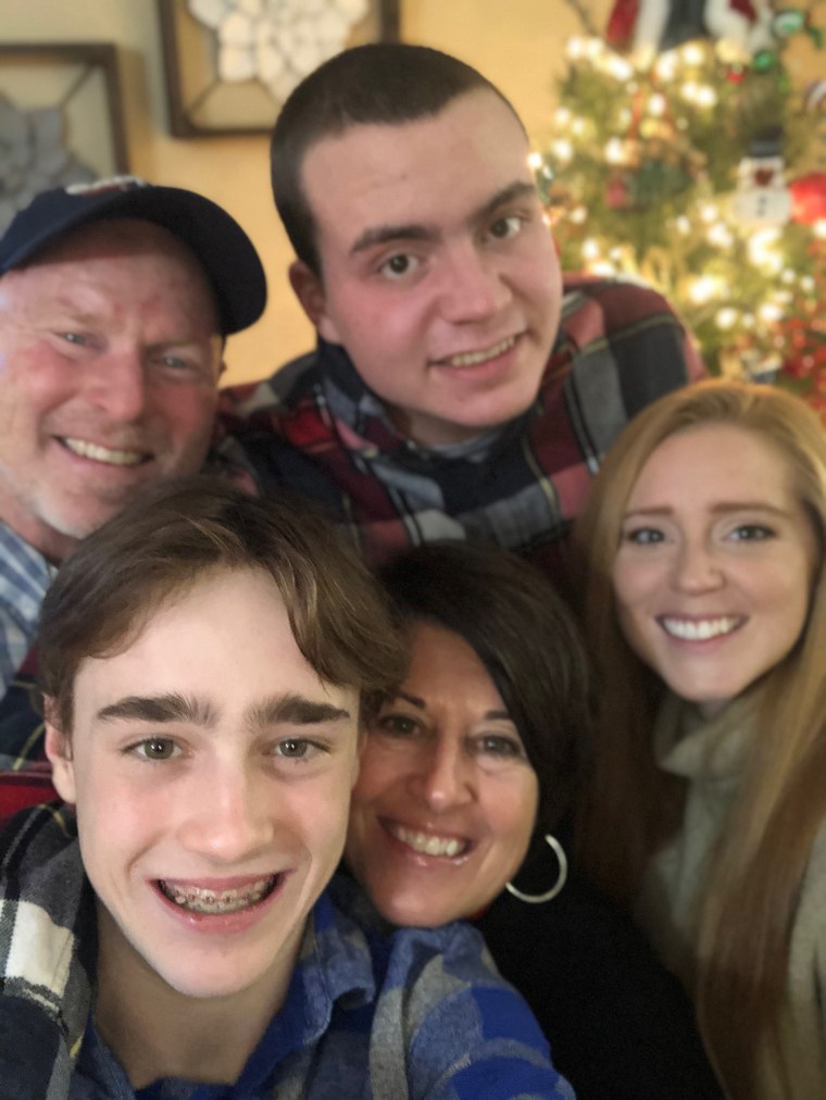 Ryan Lowry, with his parents, Rob and Tracy, and siblings, Madison and Carson.