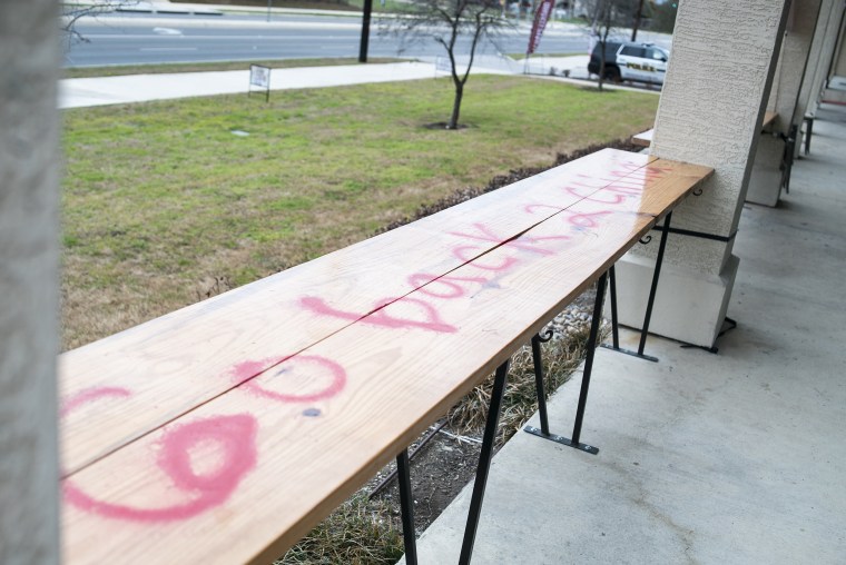 The graffiti, which had racist messages like "Go back 2 China," covered windows and tables around Noodle Tree.