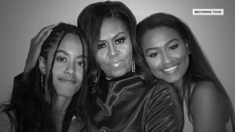 "It's even fun just peeking in and hearing them in their online classrooms," Michelle Obama said of having daughters Malia and Sasha back at home.