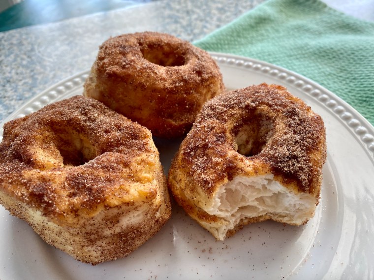 Other variations of these air-fryer doughnuts are glazed with powdered sugar and topped with sprinkles.