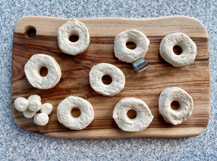 I used a cookie cutter to make holes in my doughnuts, but some TikTokers use a soda bottle cap.