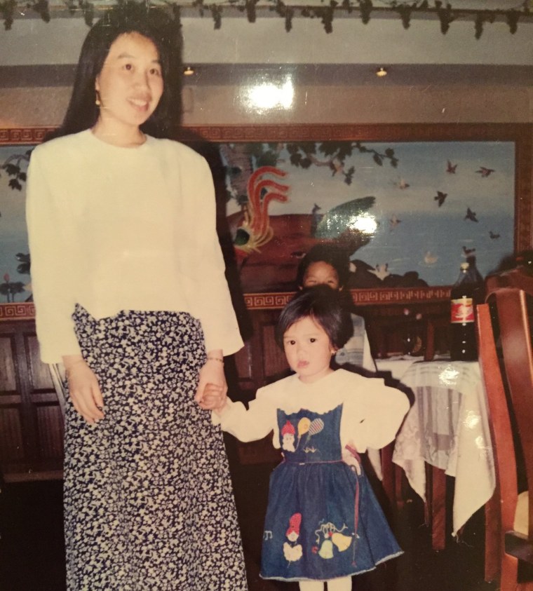 Andrea Xu as a girl with her mom at their restaurant in Madrid.