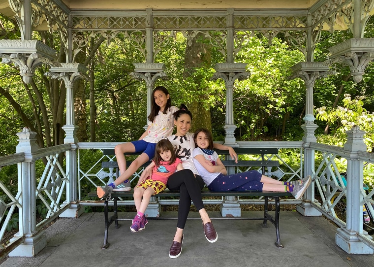 Vicky Nguyen and her daughters
