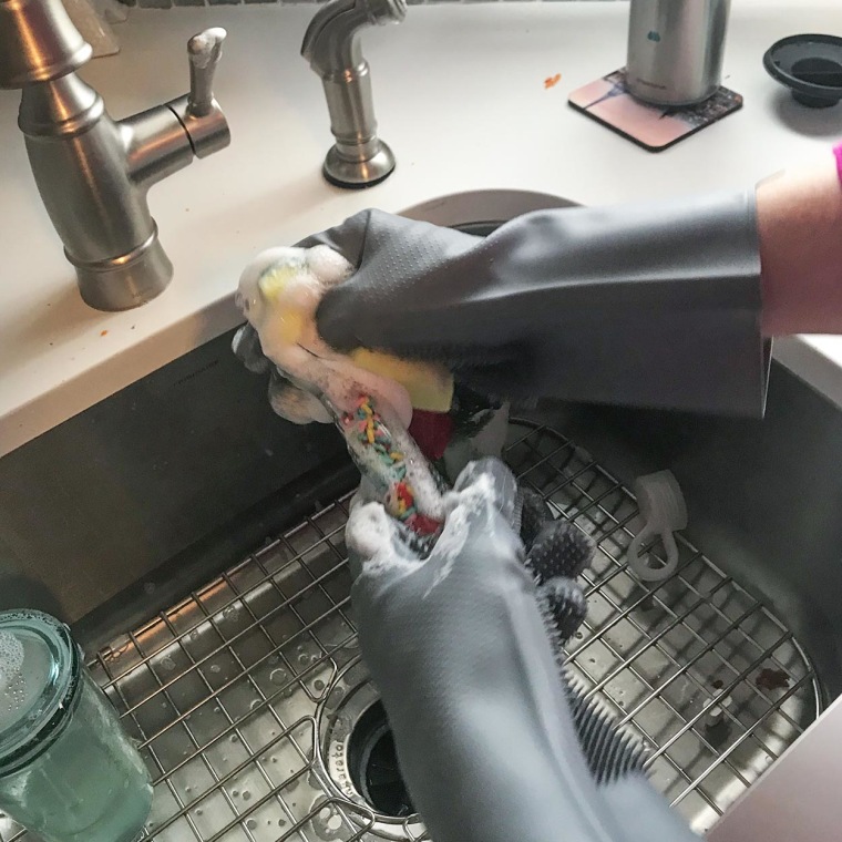 Chrissy Callahan using her grey Dish Washing Gloves with Scrubbers from Walmart plus