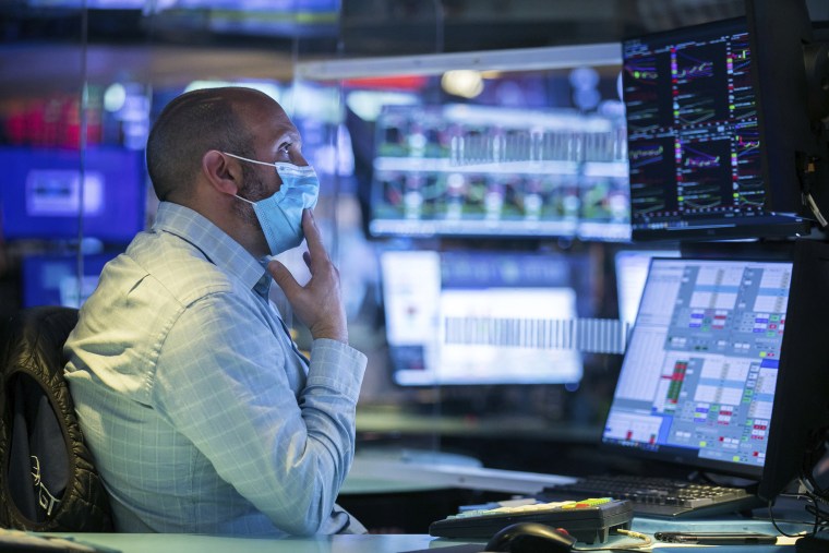 Image: Specialist James Denaro works at his post on the trading floor on the trading floor of the New York Stock Exchange