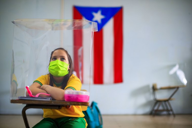 A student wears a mask at a school in Cayey, Puerto Rico, on March 4, 2021.