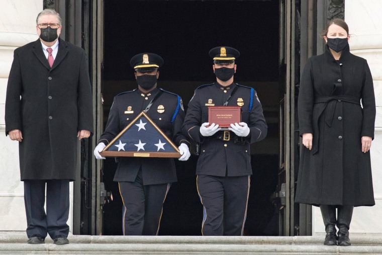 The remains of Capitol Police officer Brian Sicknick are carried down the East Front steps after \"lying in honor\" in the Rotunda of the Capitol