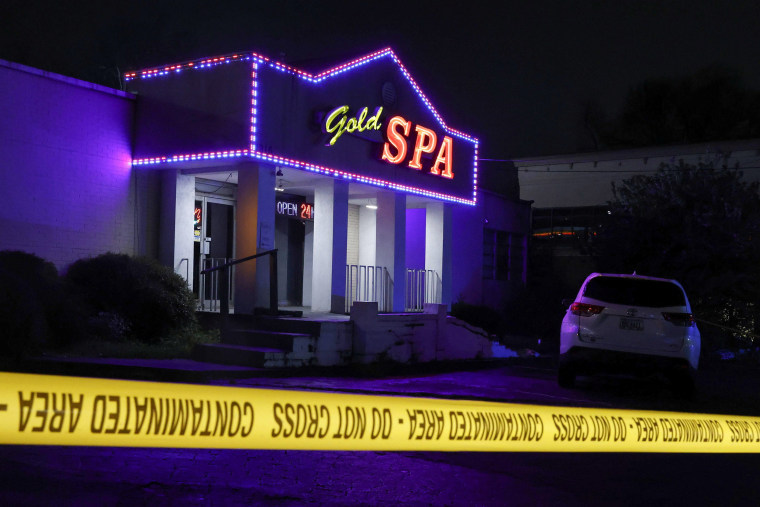 Image: Crime scene tape surrounds Gold Spa after deadly shootings