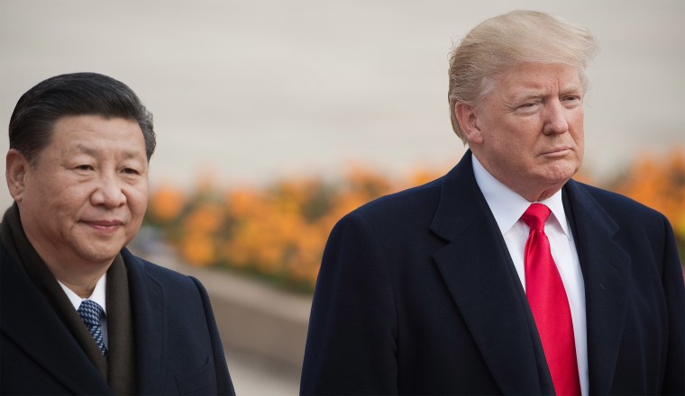 Image: Chinese President Xi Jinping and President Donald Trump attend a welcome ceremony at the Great Hall of the People in Beijing