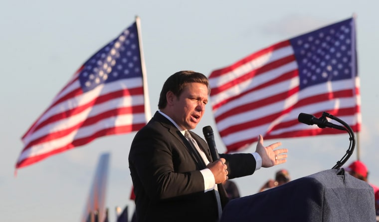 Florida Gov .Ron DeSantis speaks at a Trump campaign rally on Oct. 12, 2020 in Sanford, Fla.