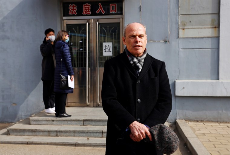 Image: Jim Nickel, Charge d'affaires of the Canadian Embassy in Beijing, speaks to the media outside the Intermediate People's Court where Michael Spavor is expected to stand trial, in Dandong