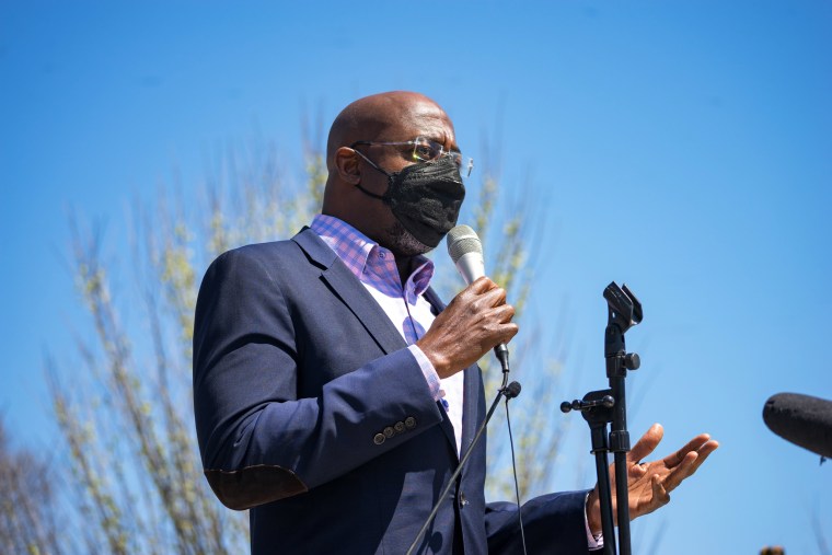 Sen. Raphael Warnock, D-Ga., speaks to a group of demonstrators gathered in Atlanta to show support for Asian and Pacific Islander communities on March 20, 2021.