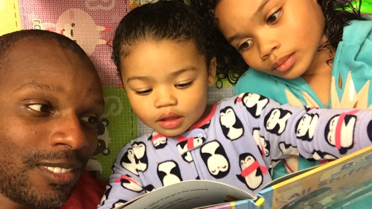 Doyin Richards with his two young daughters