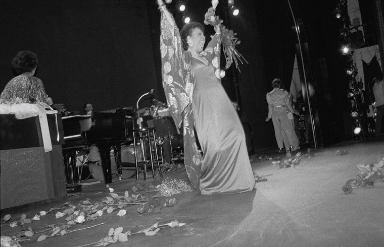 Lena Horne Posing on Stage with Flowers