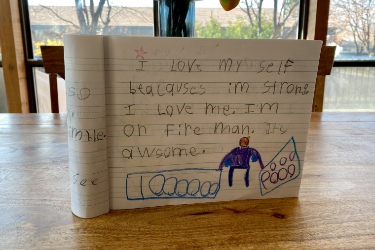 Cameron Nielsen, 7, wrote this note about himself in a school writing journal.