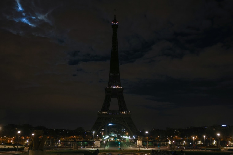 Eiffel Tower Celebrates Earth Hour In Paris