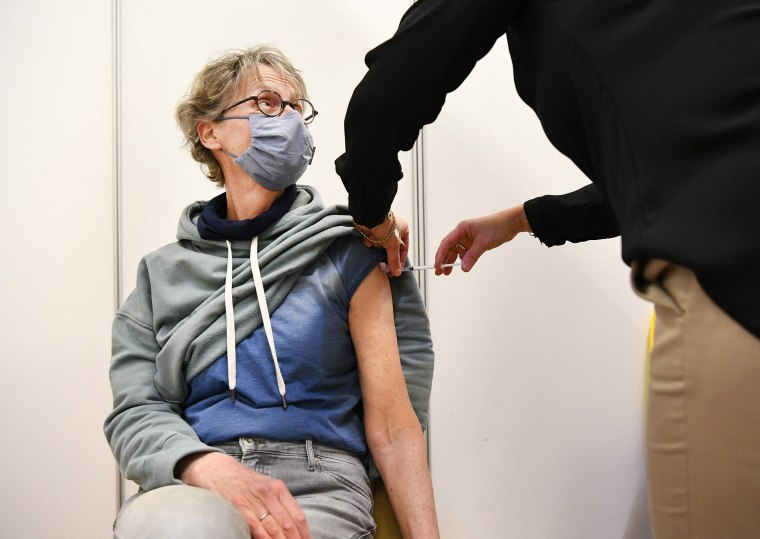 Image: A dose of the AstraZeneca Covid-19 vaccine is administered to a patient in Ede, the Netherlands, on Saturday.