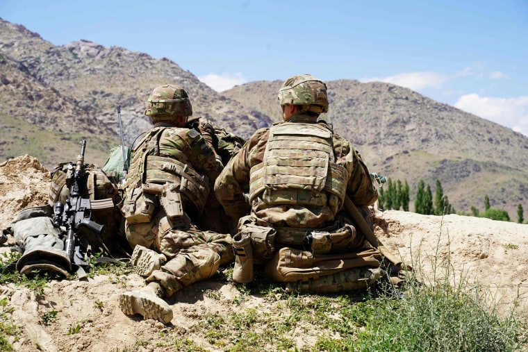 U.S. soldiers look out over hillsides in the Nerkh district of Wardak province, Afghanistan, on June 6, 2019.