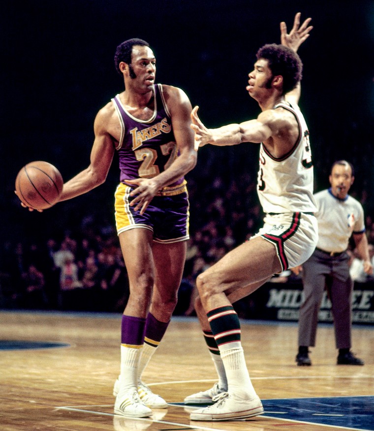 Elgin Baylor #22 of Los Angeles Lakers looks to pass against the Milwaukee Bucks during a game circa 1970 at the MECCA Arena in Milwaukee