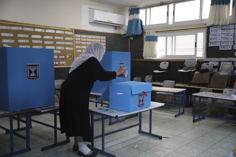 Image: An Israeli Arab woman votes 