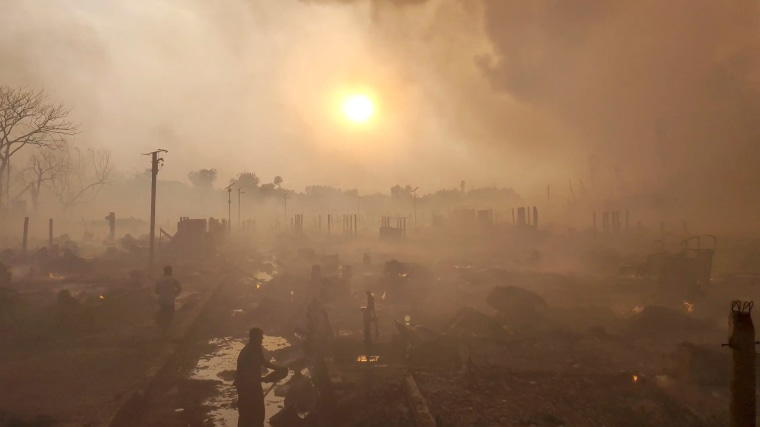 Image: A fire and smoke are seen at a Balukhali refugee camp in Cox's Bazar