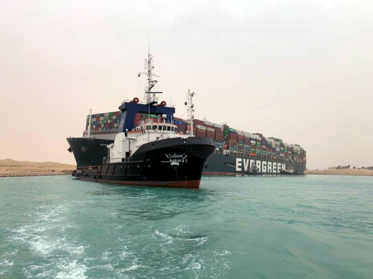 Image: Container ship runs aground in Suez Canal, blocks traffic