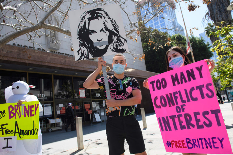 Supporters of the FreeBritney movement rally in support of Britney Spears following a conservatorship court hearing in Los Angeles on March 17, 2021.