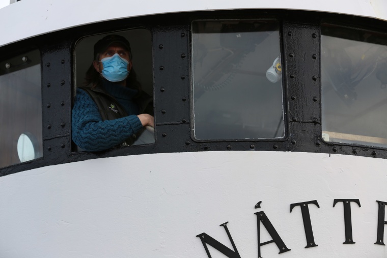 Image: Captain Heimir Hardarson, on his boat in Husavik, Iceland.