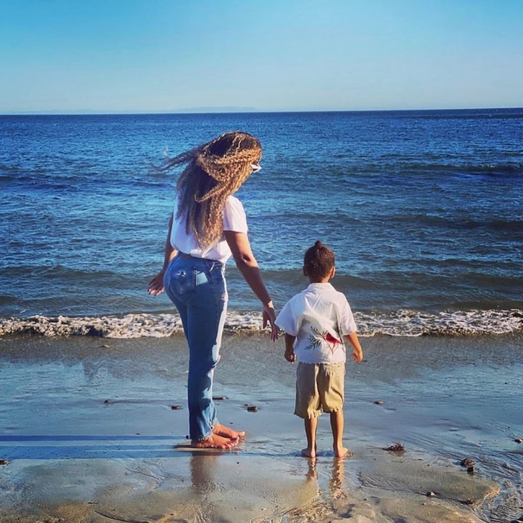 Photo of Beyonce and her son in a beach