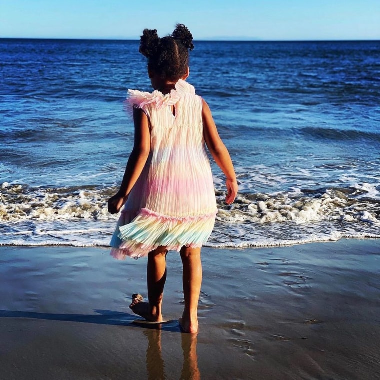 Rumi Carter in a multicolored dress in Malibu, California