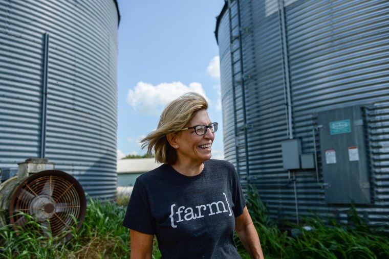 Rita Hart speaks with a reporter at her farm in Wheatland, Iowa, in 2019.