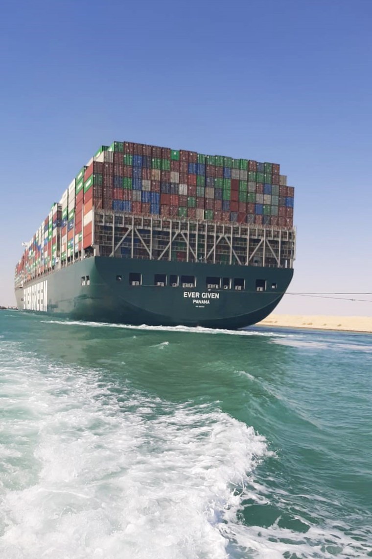 Cargo ship Ever Given sails after being freed along the Suez Canal on Monday March 29, 2021.