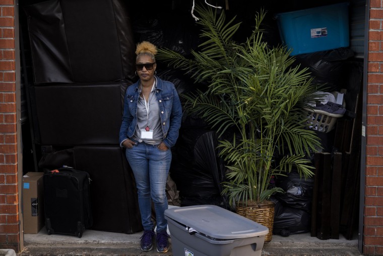 Image: Rosa Jackson in front of her belongings at Horn Lake Self Storage after being evicted from her home at the Gramercy East Apartments, in Horn Lake, Miss., on April 1, 2021.