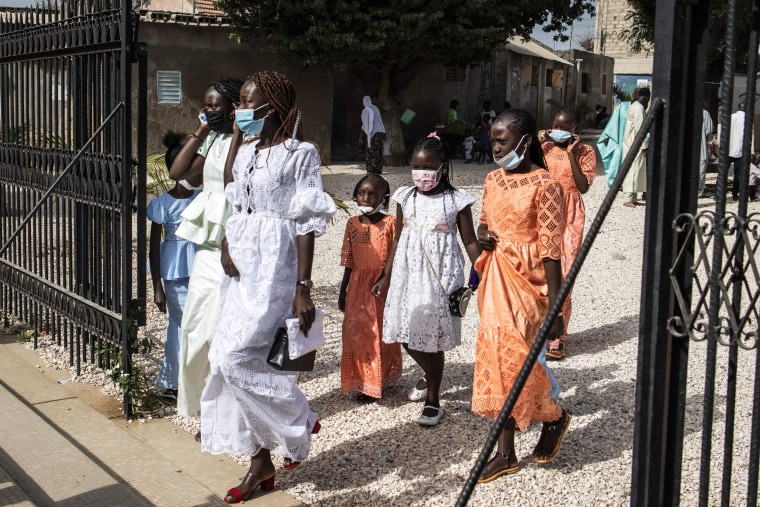 Catholic worshippers make their way to Easter Mass in Fadiouth, Senegal.