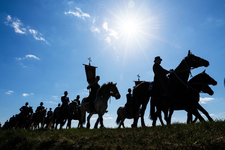 Sorbian men wearing traditional outfits take part in the annual Sorbian Easter rider processions in Rablitz, Germany, on Sunday.