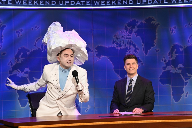 Bowen Yang as 'The Iceberg That Sank The Titanic' and anchor Colin Jost during Weekend Update on Saturday, April 10, 2021.