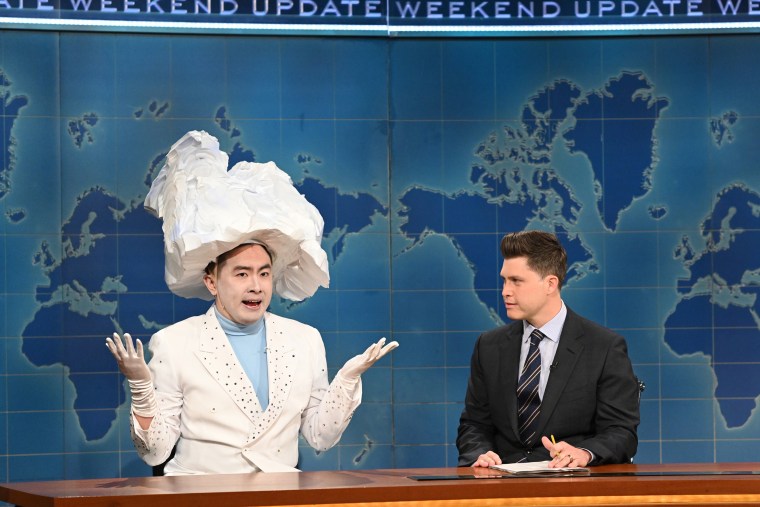 Bowen Yang as 'The Iceberg That Sank The Titanic' and anchor Colin Jost during Weekend Update on Saturday, April 10, 2021.