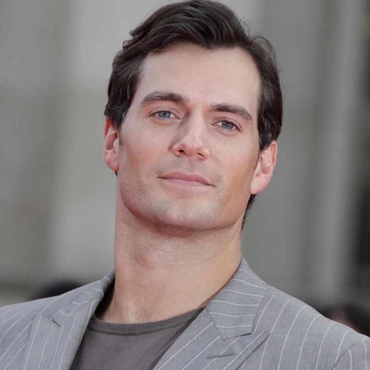 Henry Cavill slams critics, says he's 'very happy in love'