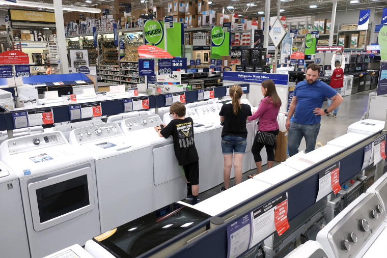 A family shops for washing and drying machines at Lowe's Home Improvement store in East Rutherford, New Jersey on May 21, 2018.