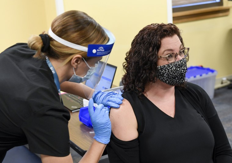 Reading School District teacher Rebecca Titus receives a Covid-19 vaccination in Reading, Pa., on March 15, 2021.