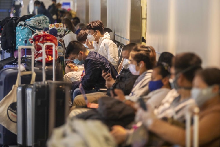 Passengers wait for a flight at Los Angeles International Airport on April 2, 2021 as the US Centers for Disease Control and Prevention on Friday released a highly anticipated update to travel guidance.
