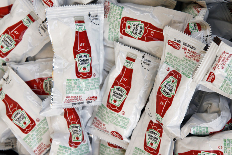 Image: Packets of single serving Heinz Ketchup.