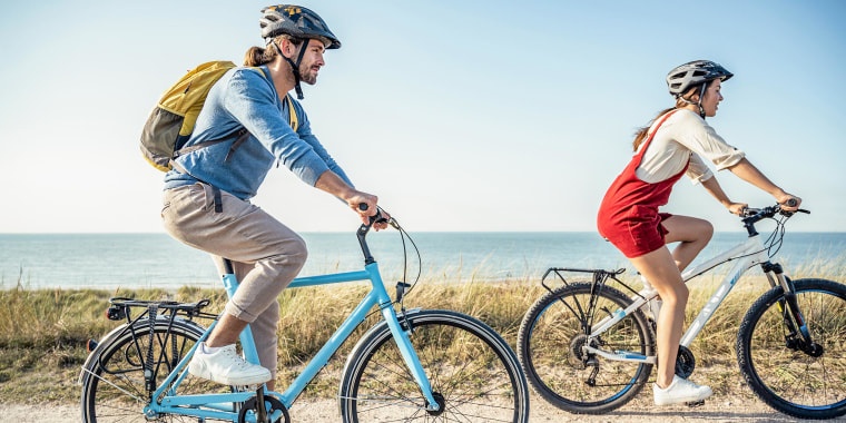 Woman and man biking on the beach, wearing helmets. Shop the best bike helmets of 2021 and learn how to choose the best bike helmet for you. See bike helmets from Schwinn, Cannondale, Giro, ABUS and more.