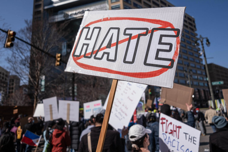 People march during a Stop Asian Hate rally in downtown Detroit on March 27,2021.