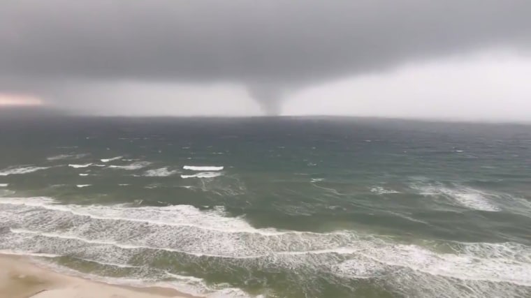 A tornado appears off the coast of Panama Beach in the Gulf of Mexico on Saturday April 10, 2021.
