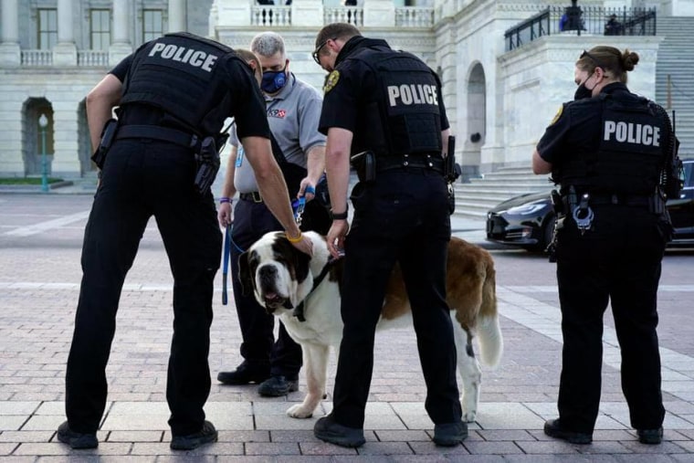 Officer Clarence meets with police